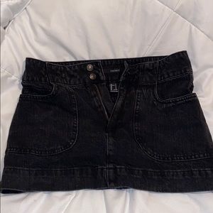 Really short black jean skirt